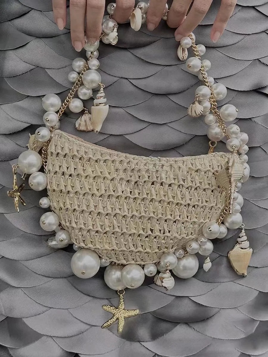 Woven Bag with Pearl and Shell detail Front on Wavy Background